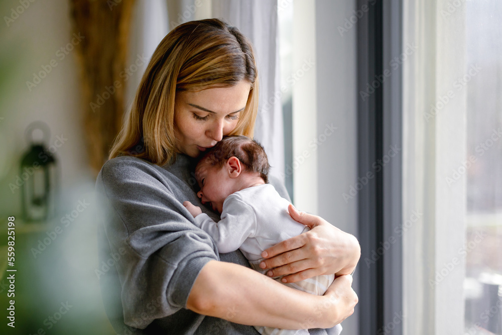 Mother smiling with her baby