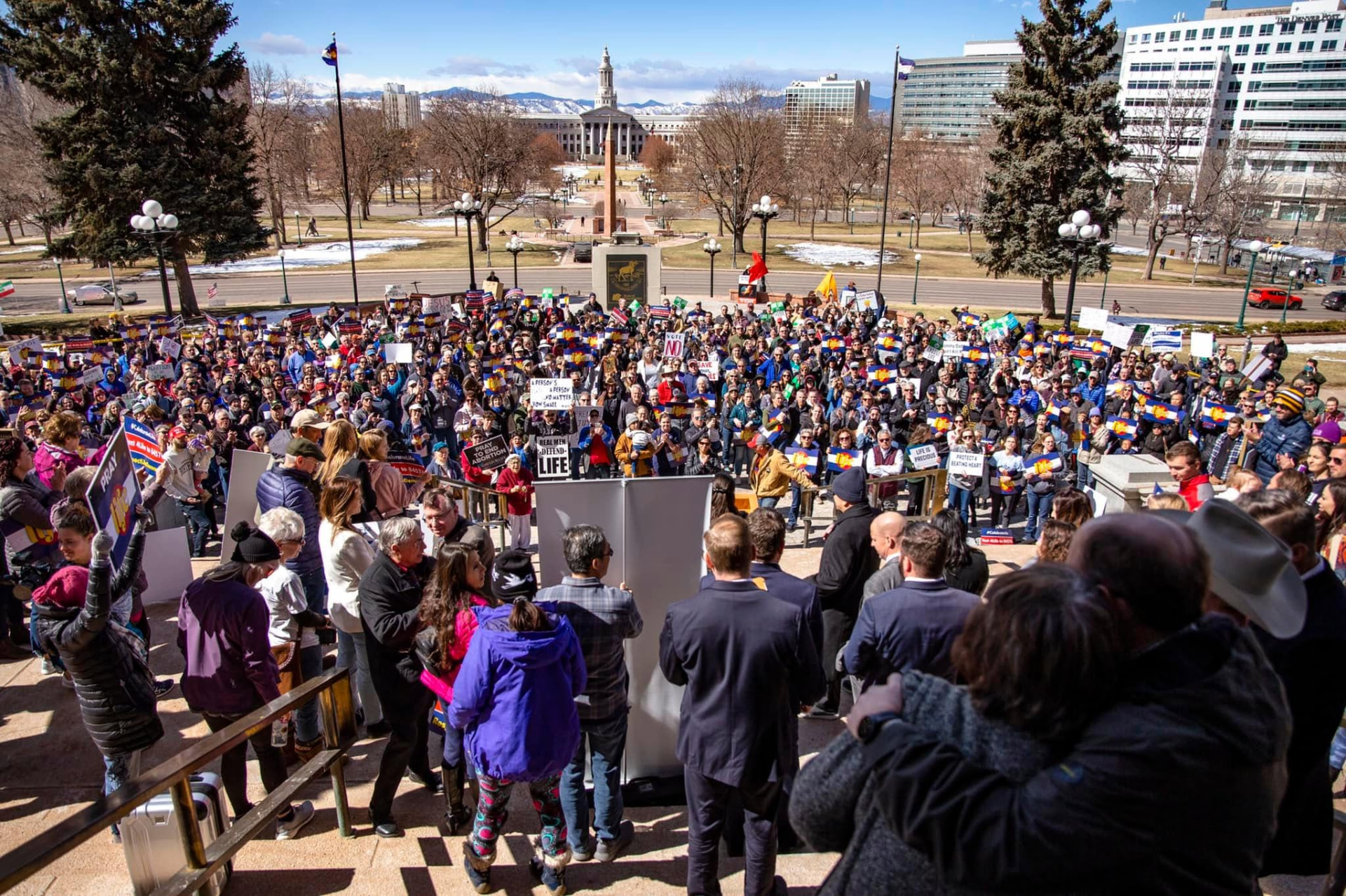 Colorado March for Life supporters gathered on the Colorado State Capitol steps