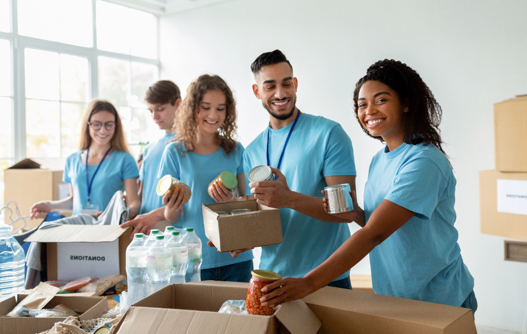 Volunteers gathering with donations